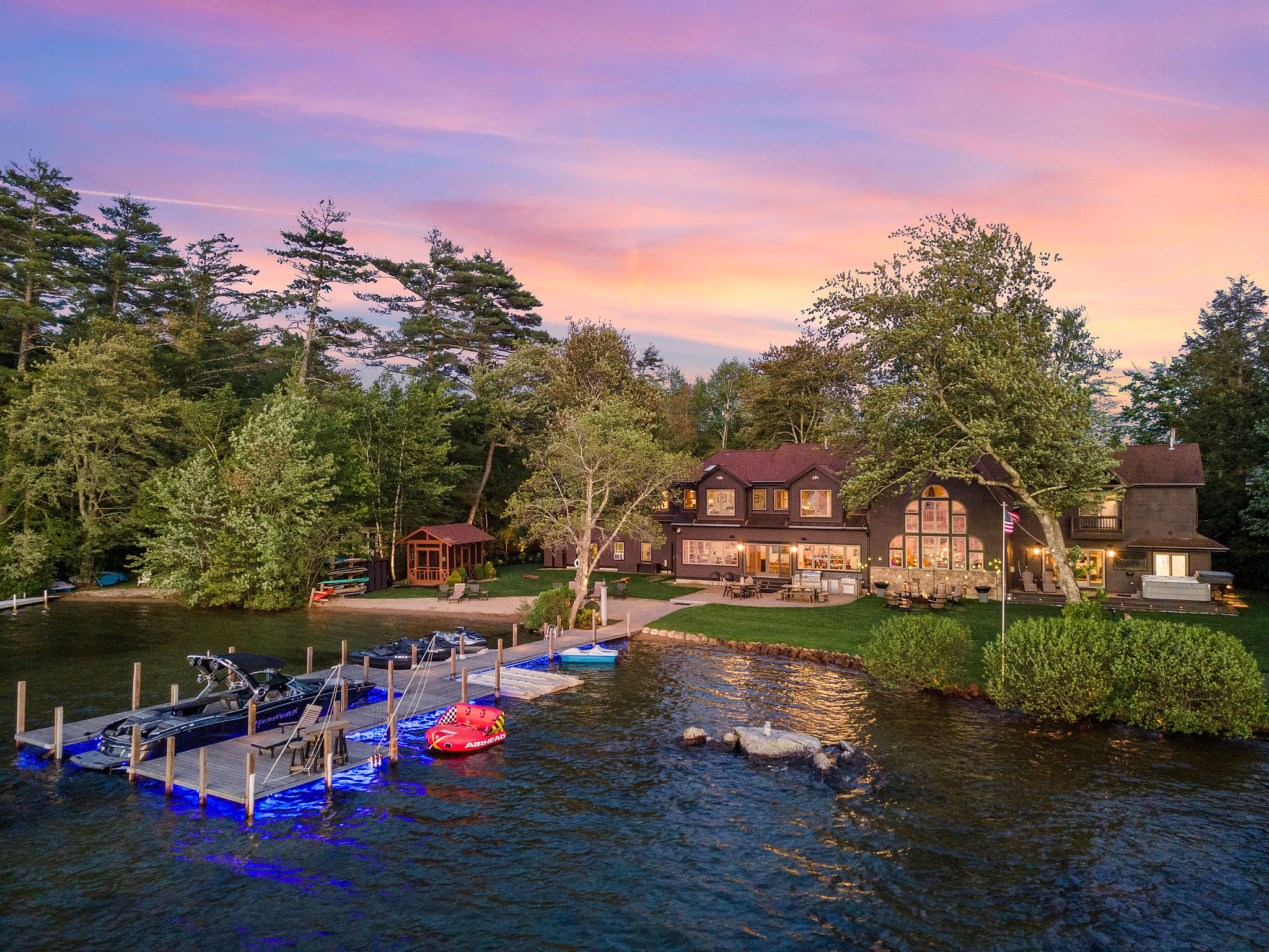 Twighlight shot of home at dusk with luxury landscape lighting