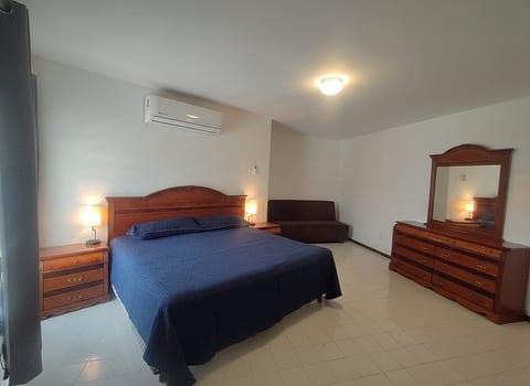 Bedroom #1 located on the upper floor.
King Size Bed
Pull-out sofa
Full bathroom
TV
Mini-split