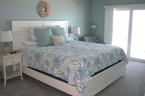 Master bedroom, balcony access, king bed