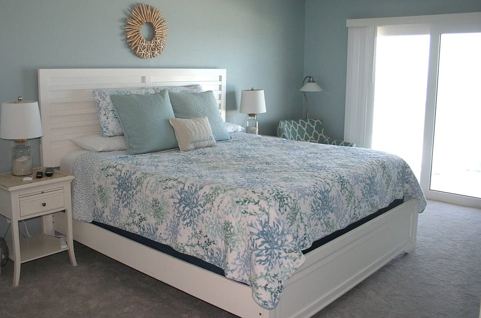 Master bedroom, balcony access, king bed