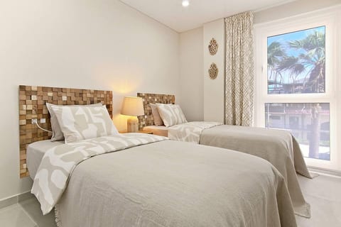 One bedroom with 2 single beds. Perfect for a family with kids or for singles