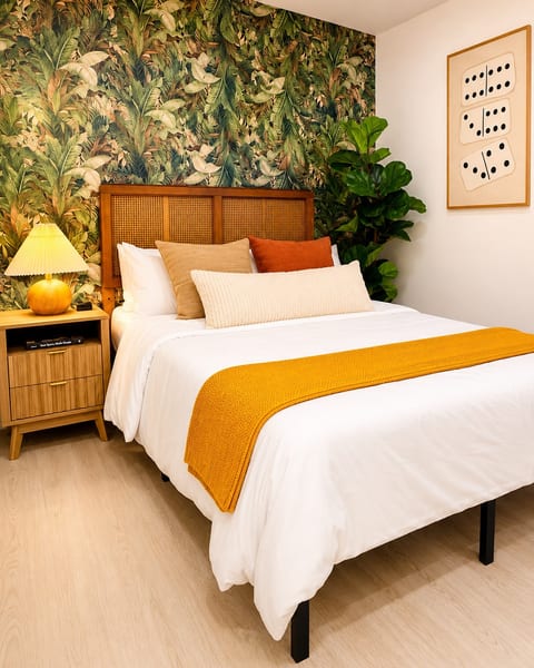 Queen bedroom with premium linens and boutique décor.