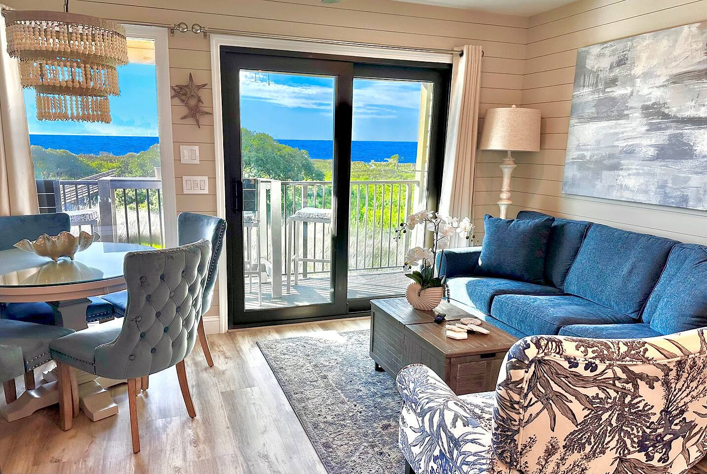 View from the living room! Enjoy the comfy couch that includes an upgraded 5" queen memory foam mattress & 75" SmartTV!