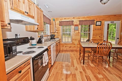 Fully equipped kitchen has everything you need to prepare meals during your stay.