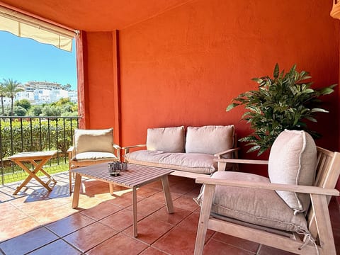 Pool view private terrace ground floor Mijas Costa with barbecue by Solrentspain