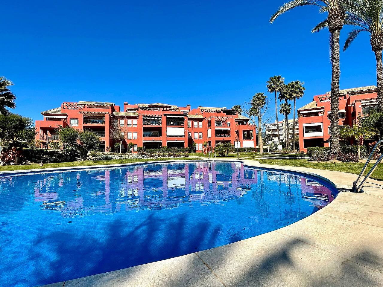 Pool view private terrace ground floor Mijas Costa with barbecue by Solrentspain