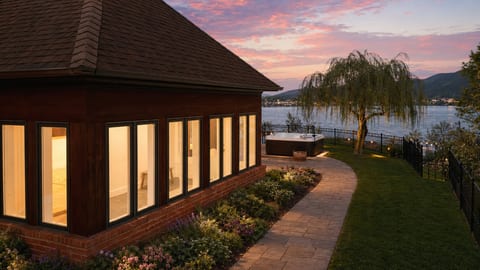 Sunroom exterior w/ hot tub in background