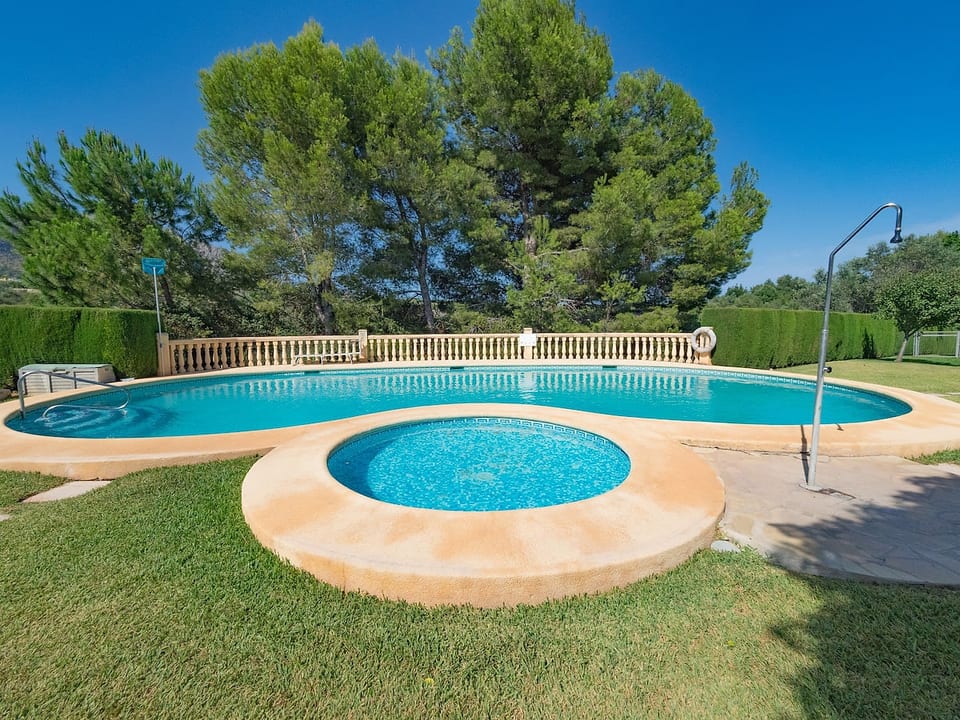 Corner townhouse in a residential development with a community pool image 1