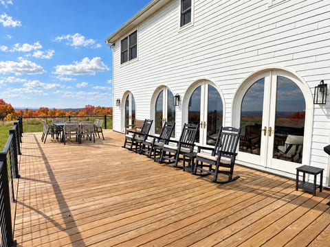 Deck with rocking chairs and valley views