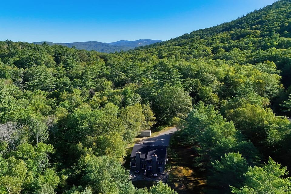 Situated on 2 acres of land surrounded by trees