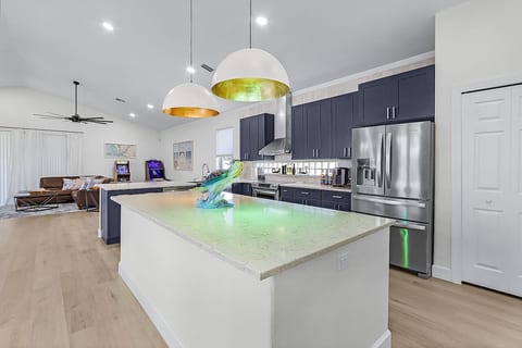 This kitchen is fresh and clean and full of all the things you would expect to prepare a fine meal for yourself and your friends and family. There is also a fully stocked coffee bar and Nespresso machine.