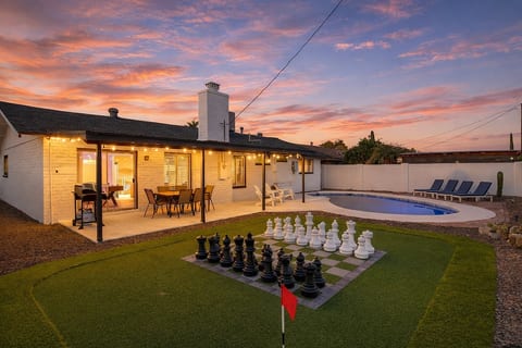 Backyard at dusk — a relaxed setting for evening downtime and casual games.