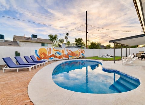 Additional view of the pool and lounge area.