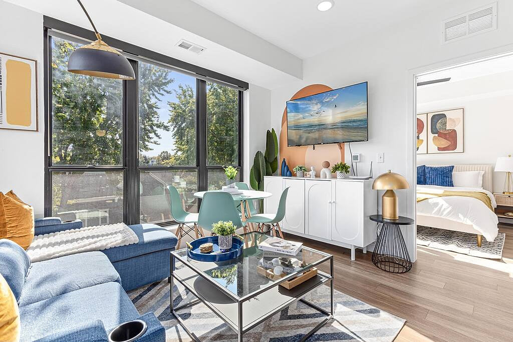 Bright, modern oasis with chic decor, smart TV, and cozy bedroom for ultimate comfort.