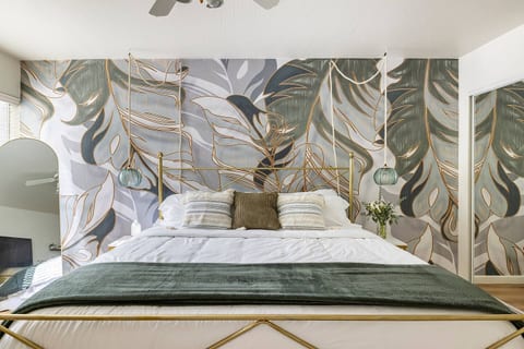 Melt into bed with this cozy King mattress, plush pillows and comforter/duvet combo. Full length mirror with trendy wallpaper makes for the cutest photos.