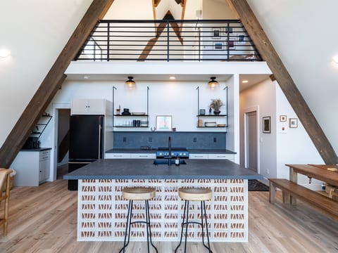 Open kttchen with island and bar seating