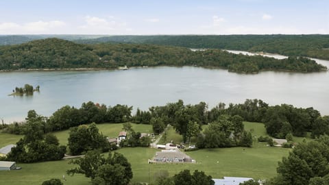 Scenic lakefront setting with sweeping water views and spacious grounds