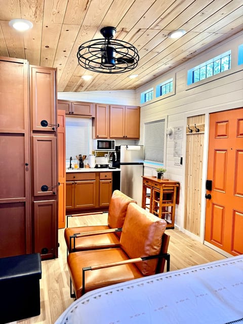 Every inch earning its place — the full open-plan living and kitchen space