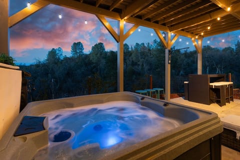 Soak under glowing skies and string lights — pure peace after Yosemite hikes