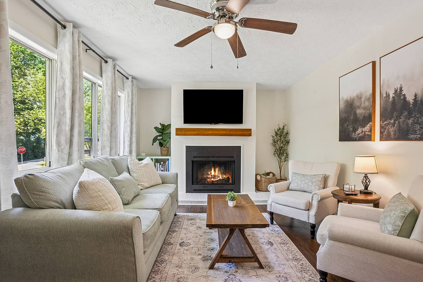 Cozy living space with plush seating, warm decor, and inviting charm—perfect for unwinding, reading, or enjoying time with loved ones. Designed for comfort and relaxation, with soft lighting and stylish accents that create a welcoming atmosphere.
