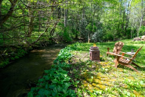 Enjoy effortless evenings by the creek with a convenient propane fire pit- just turn it on and relax.