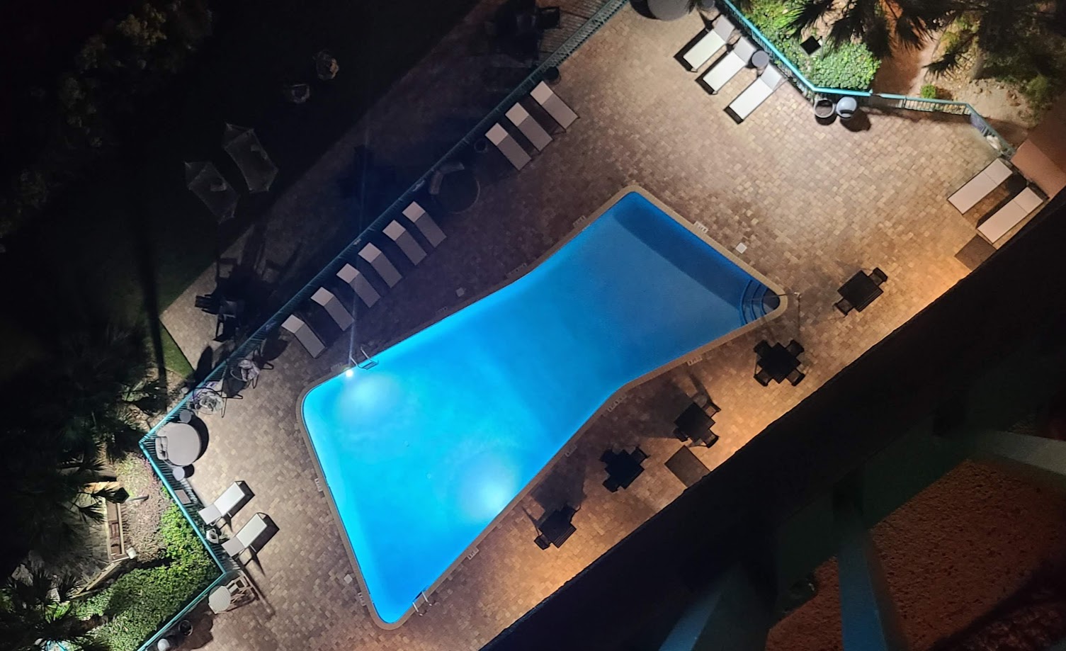 Pool view at night from the balcony