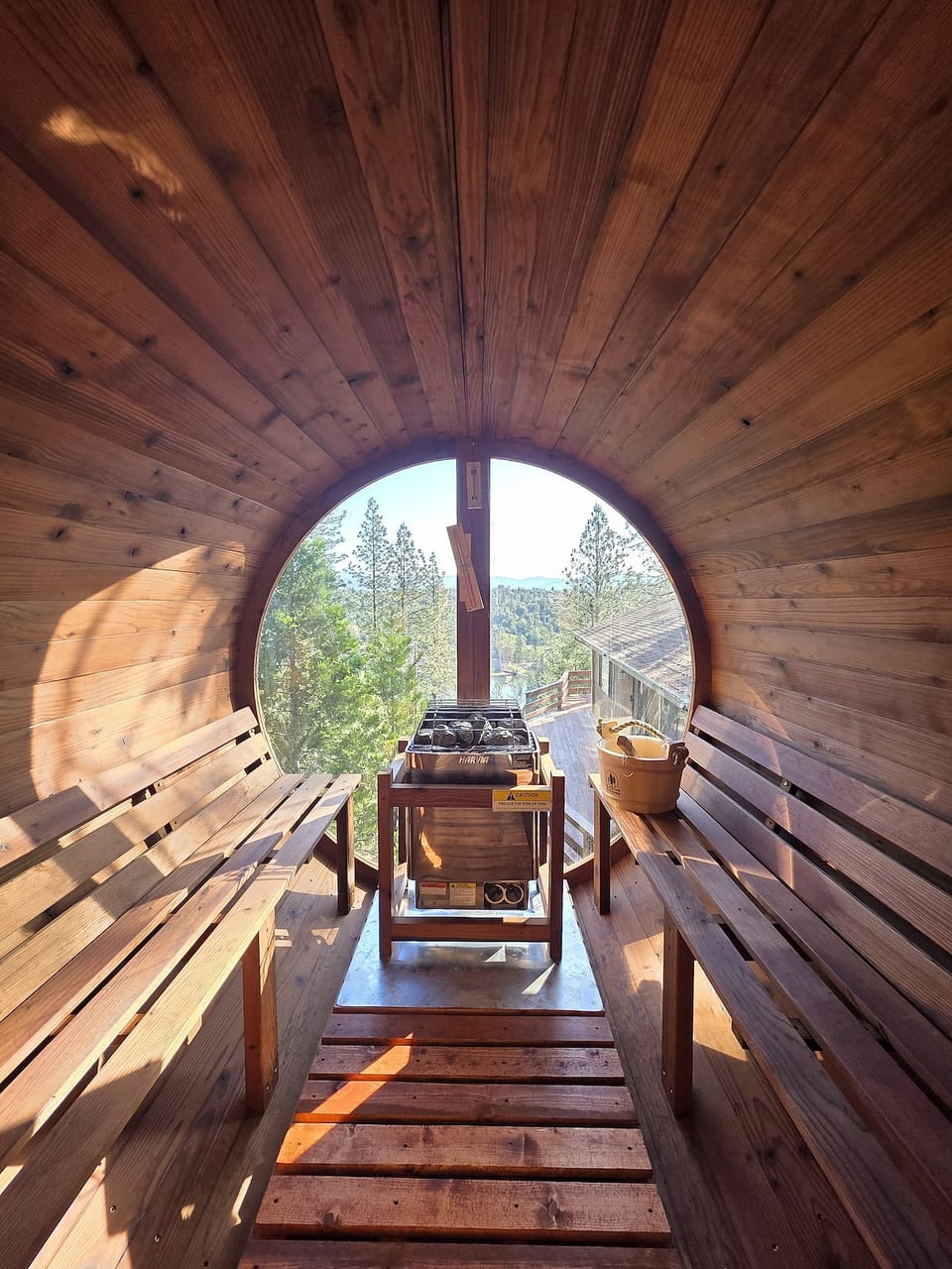 Enjoy the Panoramic Redwood’s steam sauna view from raised deck.