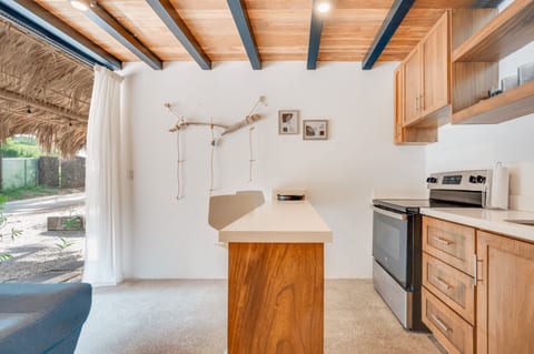 Full kitchen and dining area.