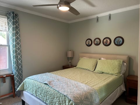Back Bedroom with queen bed, 2 long bunks & toddler mattress.