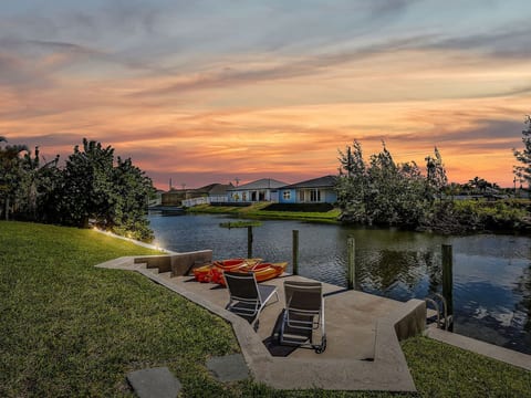 Take in sunset views from the canal-front dock, with kayaks and lounge seating for laid-back days on the water.