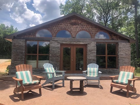 You'll be staying at Lake House.
Lizardsniffer has a variety of unique guest cabins but Lake House is the one if you want to be steps away from casting out a lure or floating in the lake.