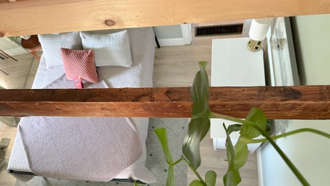 The view of the bedroom from the loft