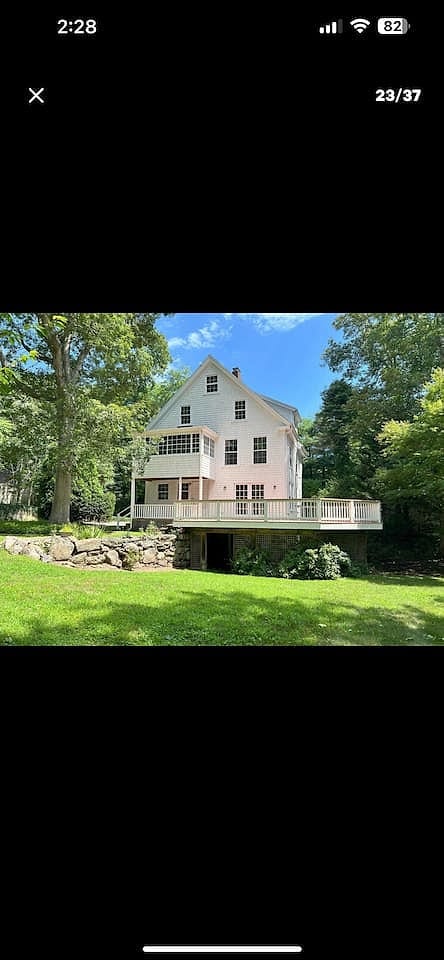 Historic home with wrap around deck on 1/4 acre.