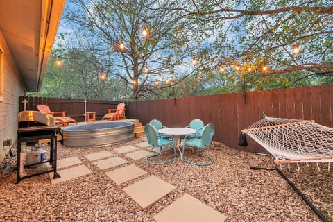 A small cowboy pool and deck in the backyard with a grill, the perfect addition to your outdoor retreat.