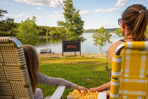 Soak in peaceful lake views from the pool and hot tub area, your front-row seat to relaxation.