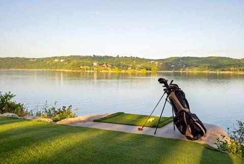 Tee off with lake views from the putting green, where mornings start slower and vacations feel longer.