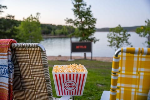 Grab snacks, settle into your seat, and enjoy outdoor movie nights with a front-row view of the lake.