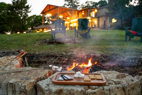 End the day around the fire with cozy seating, glowing sunsets, and unforgettable lakeside memories.