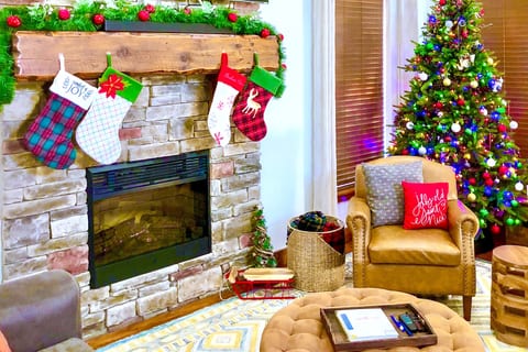 Decorated for the holidays, Nov–Jan: stockings and a lit tree by the fireplace. Cozy up in the leather chairs and make it a Christmas to remember.