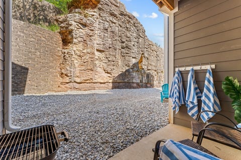 Most Branson balconies face a parking lot. Yours faces a natural rock bluff. It's quiet, completely private, and a genuinely good spot for morning coffee before anyone else is up.