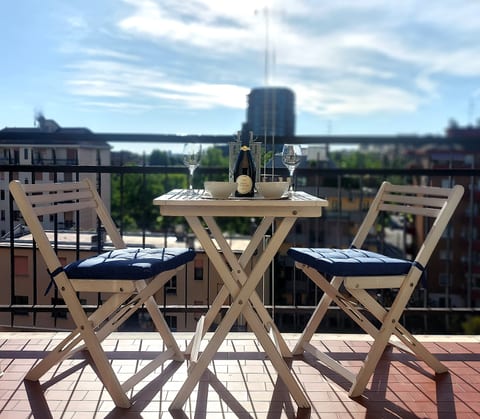 Aperitivo with sunset city skyline view