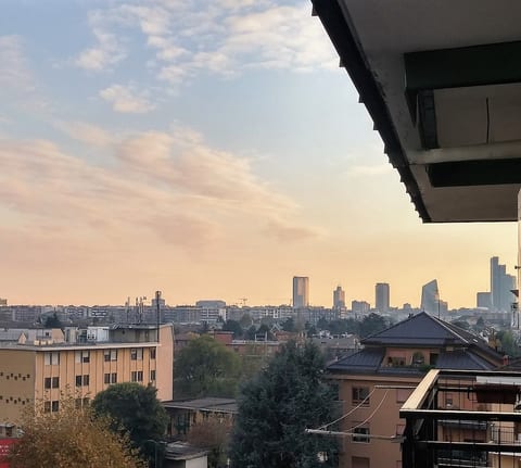 Private balcony and outside furniture for breakfast, coffee and break moments to view the city skyline.