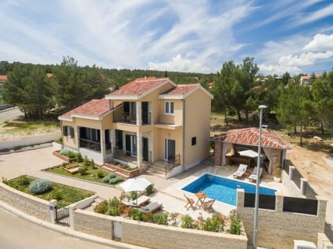 Beachfront villa Noa with heated pool