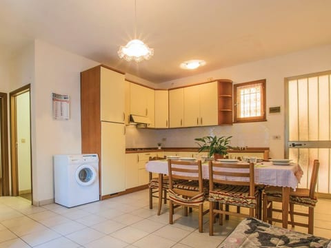 Wohnung in Rosolina Mare mit Garten