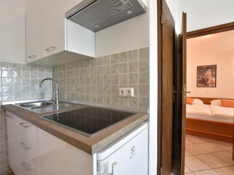 Wohnung mit gemeinschaftlichem Pool und Grill
