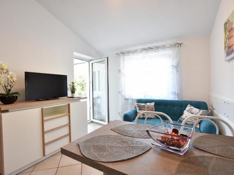Wohnung mit gemeinschaftlichem Pool und Grill