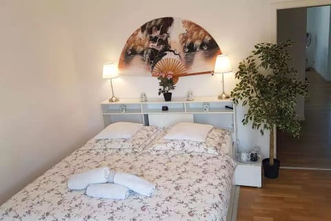 Room 1,  large double-bed (1.8 meters wide)