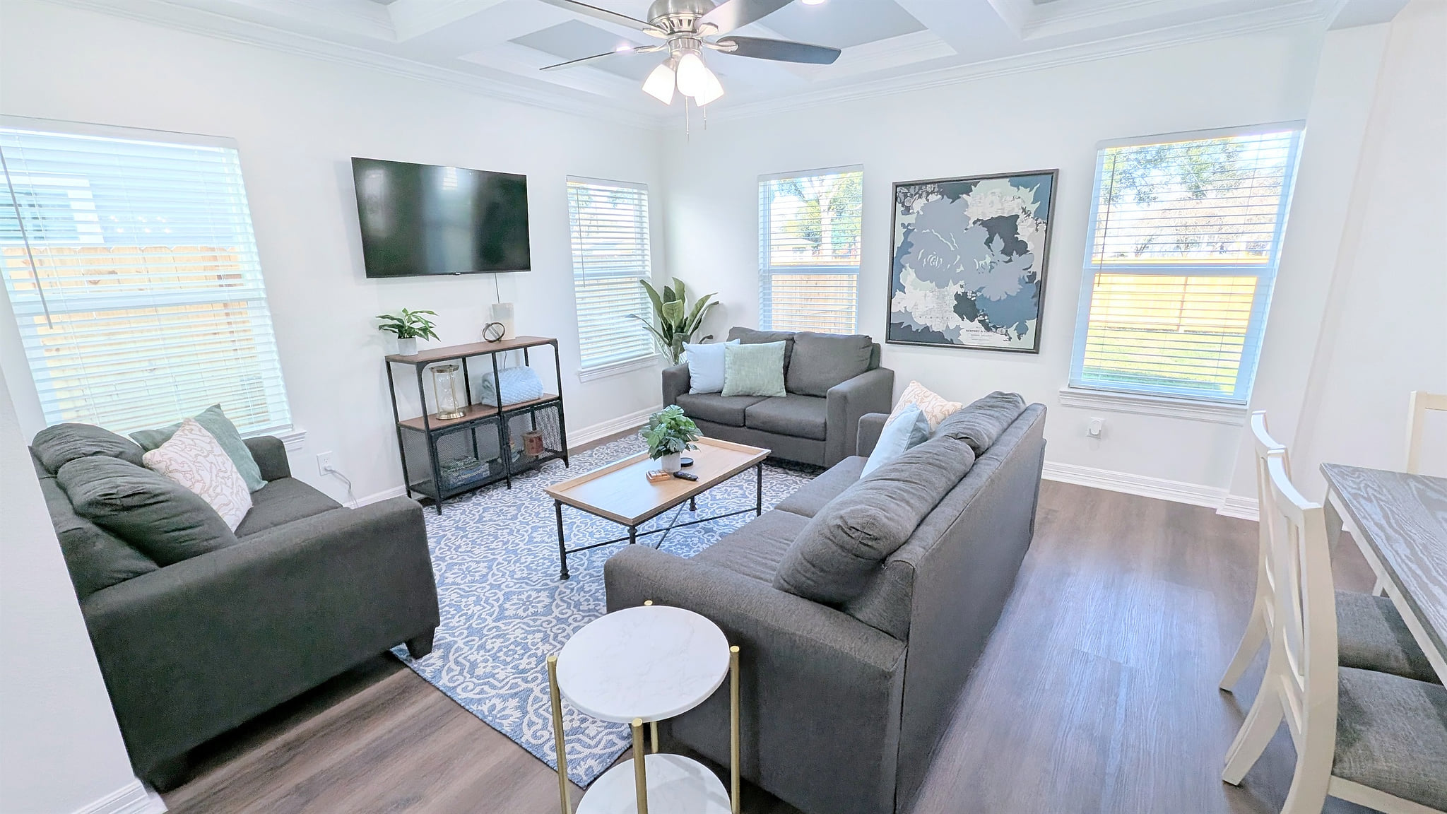 Relax in this amazing living space that flows into the kitchen and dining areas. 