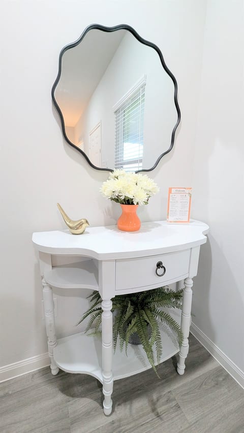 Drop your keys or check your look before heading out in this welcoming entry.
