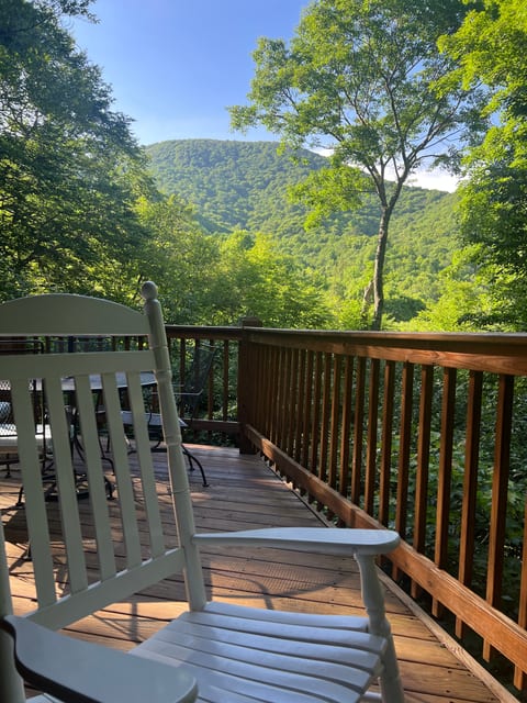 Consider bringing the white rockers from inside out on the covered porch for a relaxing afternoon.